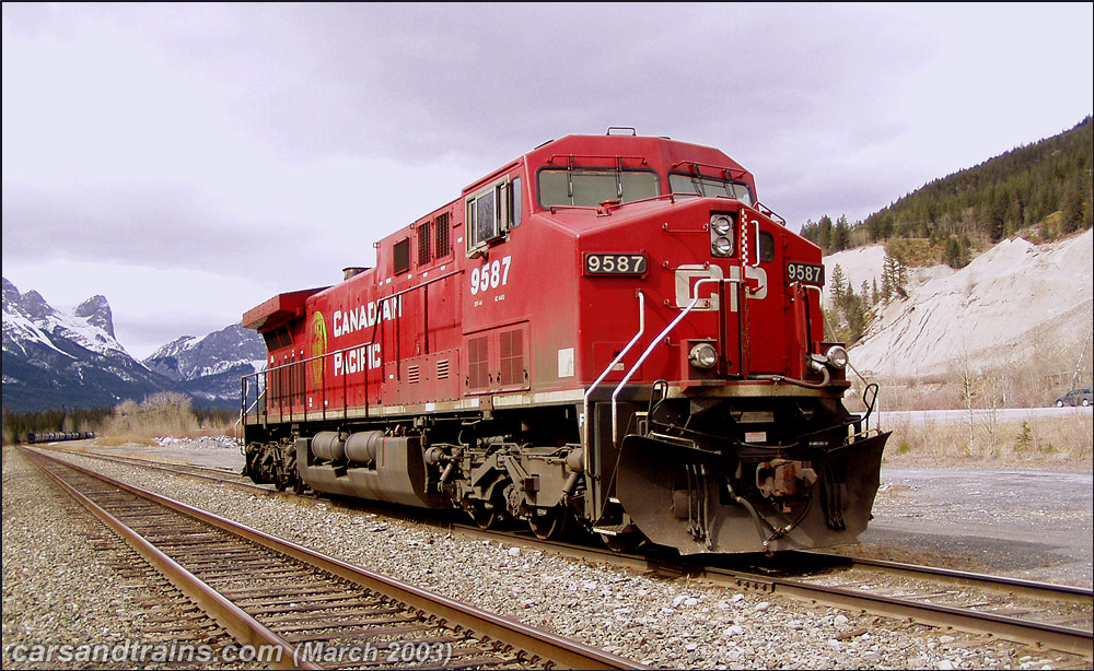 Canadian Pacific GE AC4400CW unit 9587 is at a siding east of Canmore, Alberta