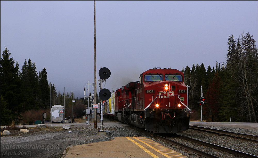 Canadian Pacific AC44CW unit 9822 is approaching Banff, Alberta