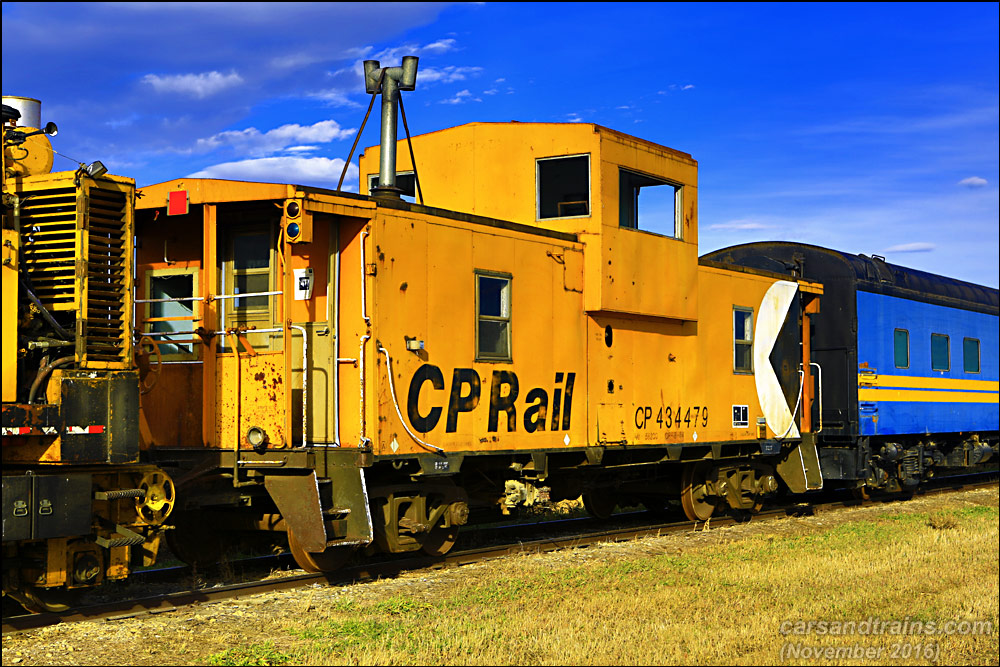 An old CP Rail caboose is at a siding in Mossleigh, Alberta.