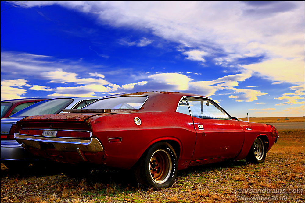 An old Dodge Challenger waiting for a restoration.